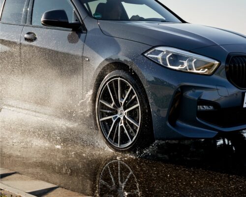 Two-Stage Modeling Approach for Solving Large-Scale Production Planning MILPs with Hexaly